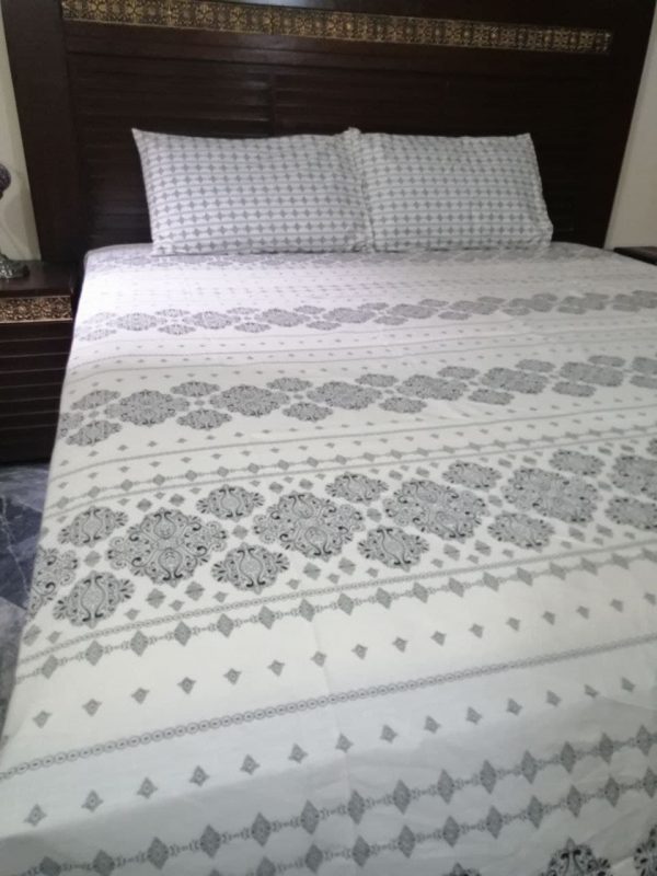 printed luxurious white bed sheet