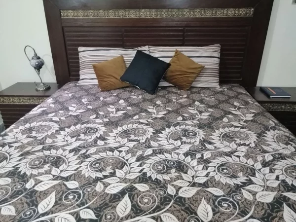 black flowered bed sheet ashlet